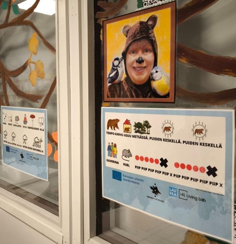 picture of tempo bear in window.