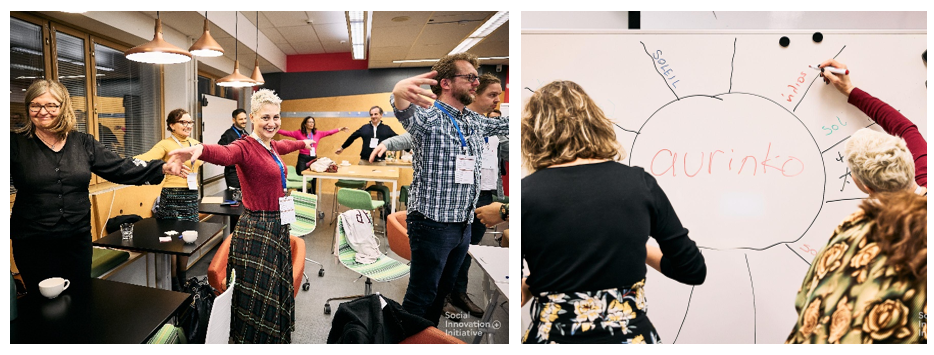 participants singing and writing words on board.
