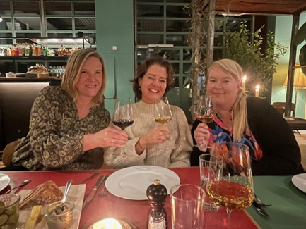 Pioneer partners connecting over a farewell dinner.