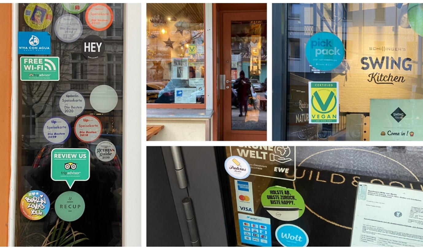 Vastuullisuudesta viestivät ovitarrat ovat Berliinissä tuttu näky. Erityisesti kestotakeaway -astioita tarjoava Recup-ovitarra ja Vegan-ovitarra näkyivät monissa paikoissa. 